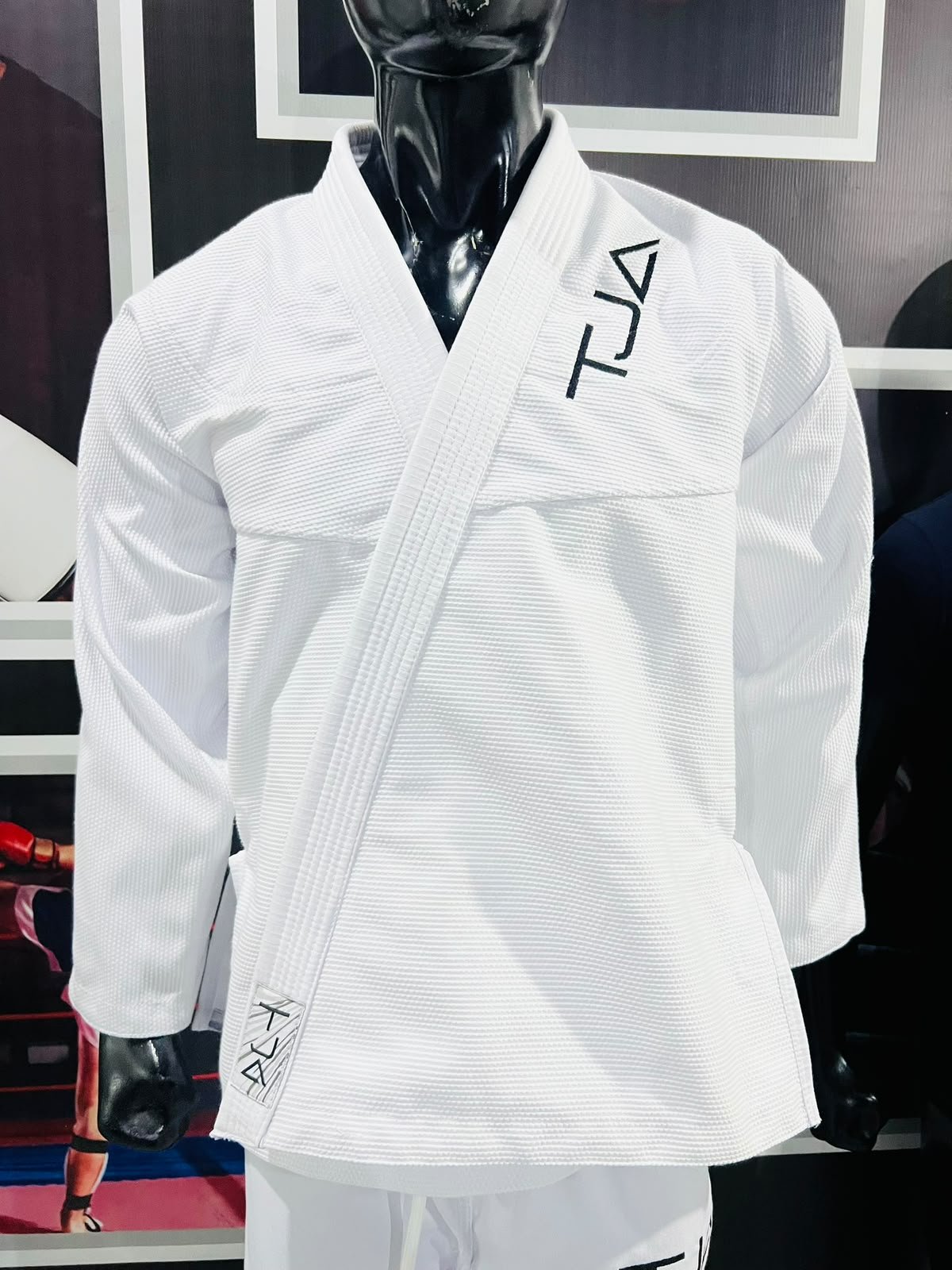 Close-up of karate gi collar stitching and textured fabric