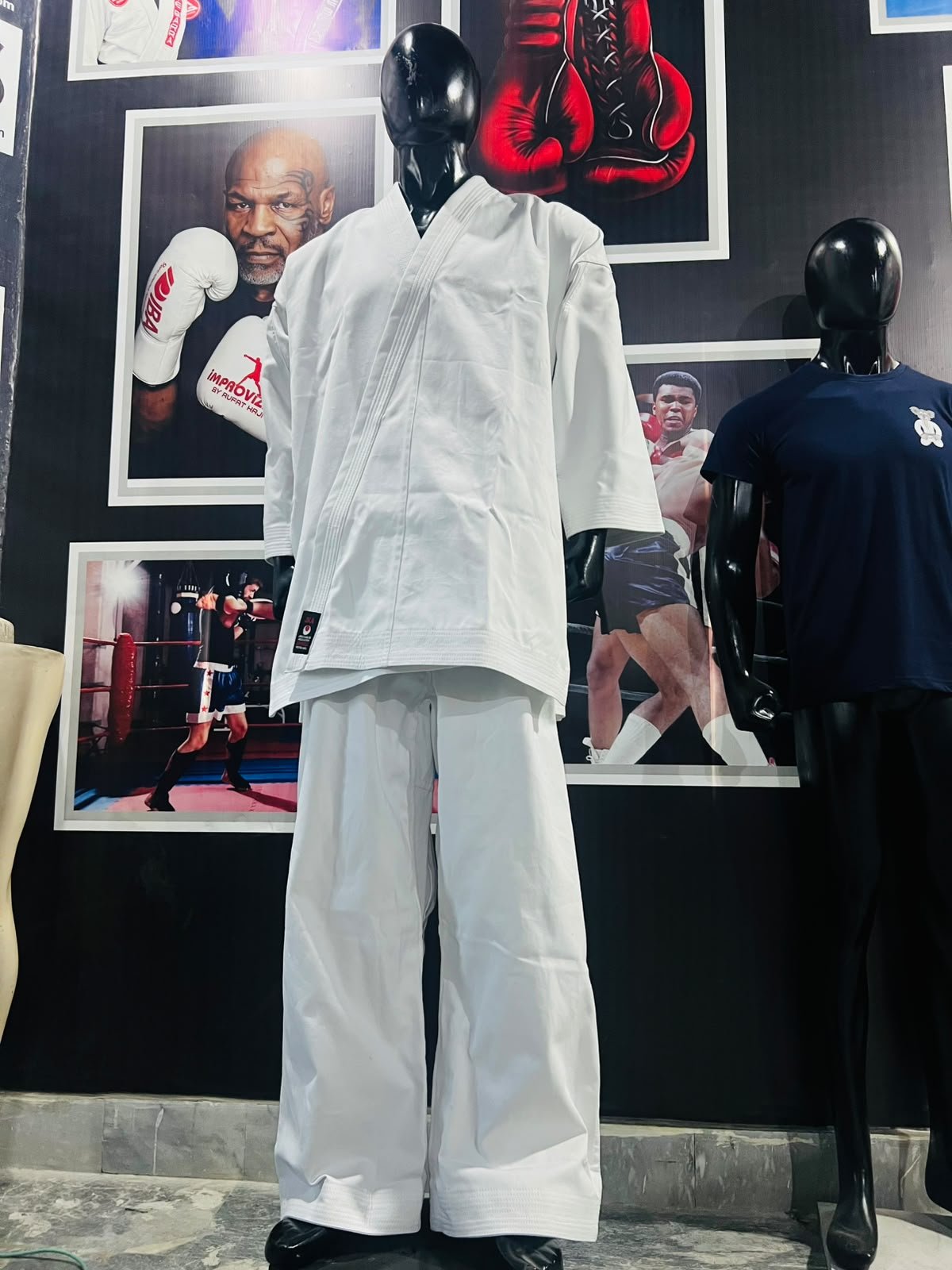 Traditional plain white karate uniform set with jacket and trousers